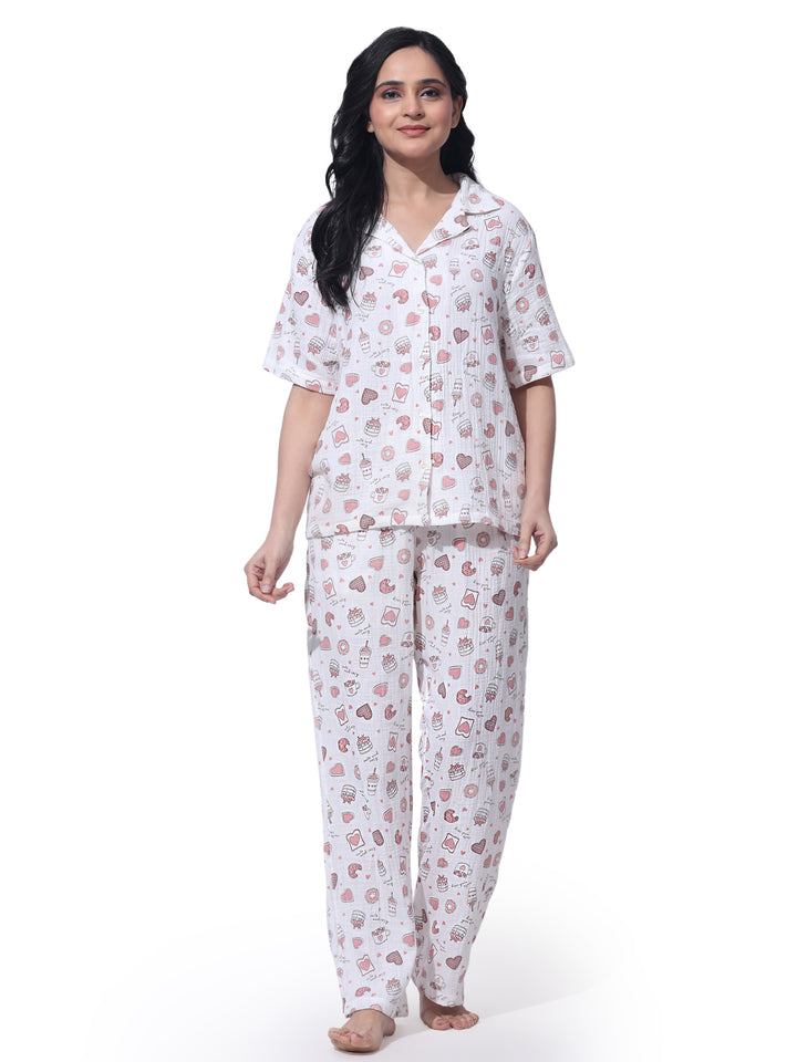 Comfortable women’s off-white printed night suit with button-down top and relaxed pajama pants. Soft breathable viscose fabric perfect for sleepwear and loungewear.