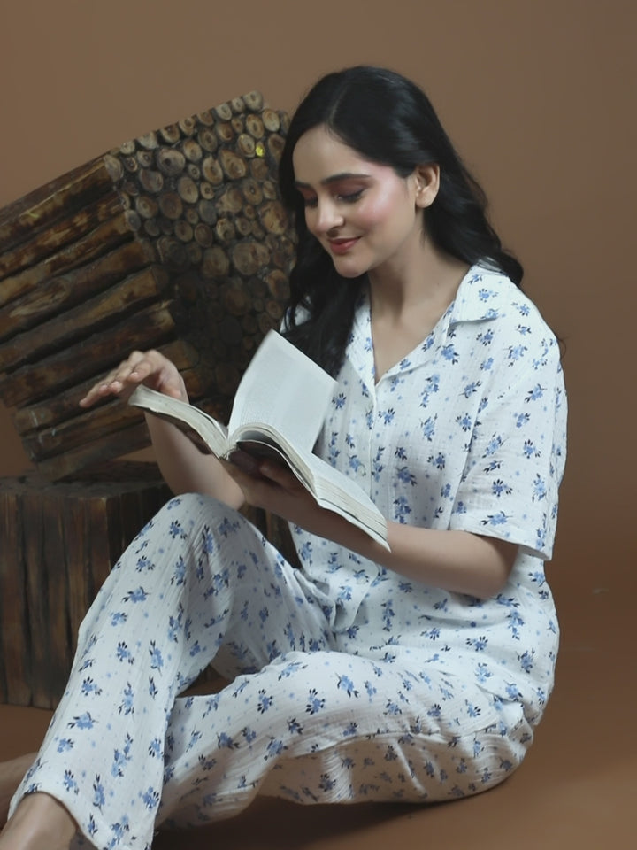 Video showcasing women's cotton night suit – half sleeve top, pants with pockets, and soft fabric
